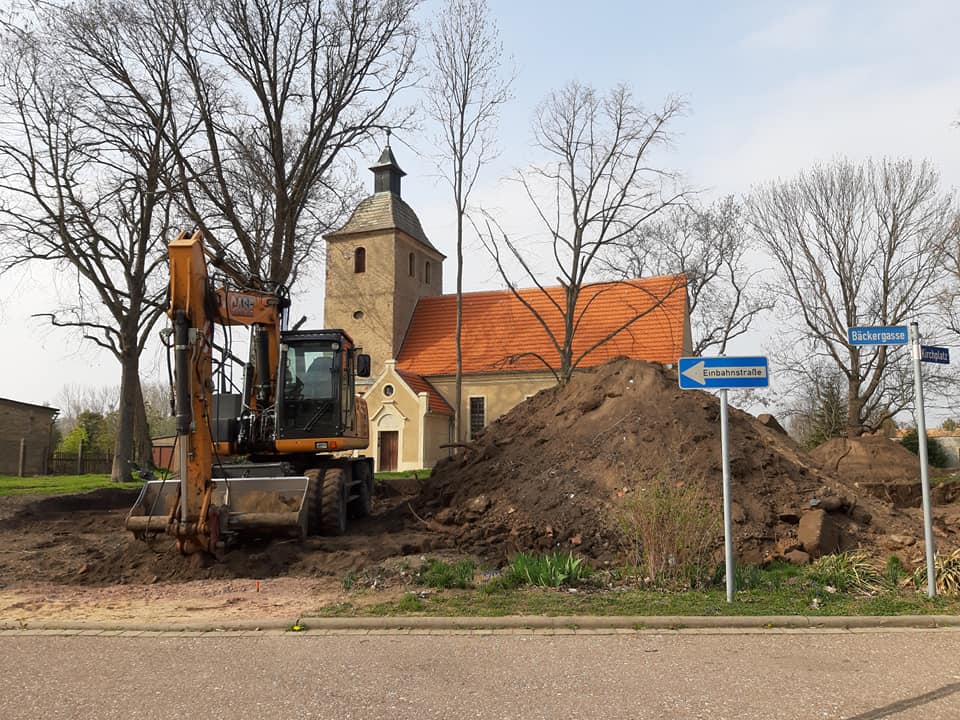 Der Bagger auf der Baustelle